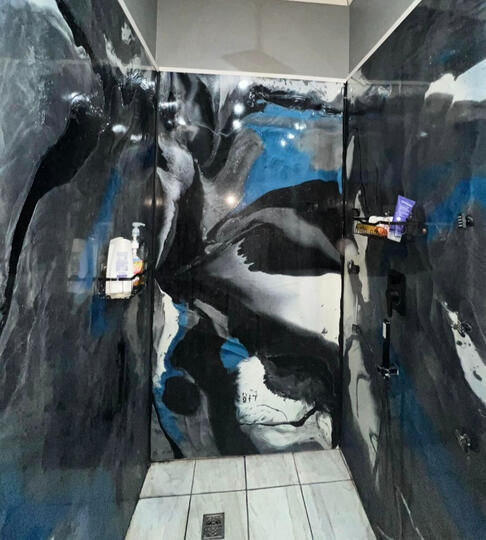 Black, white, and blue epoxy shower walls. Black, white, and blue epoxy shower walls done in Cement, Oklahoma.