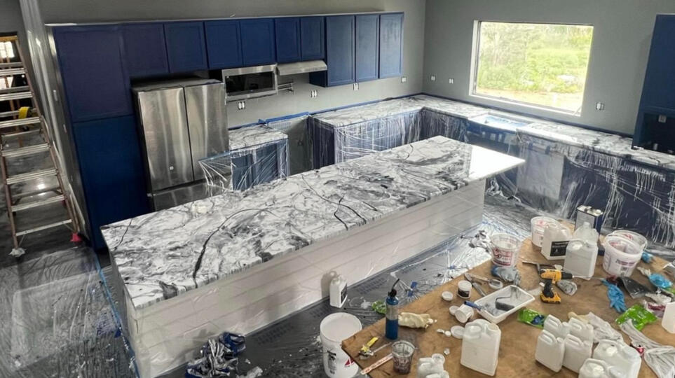 Silver, black, and white epoxy kitchen countertops. Silver, black, and white epoxy kitchen countertops done in Cement, Oklahoma.