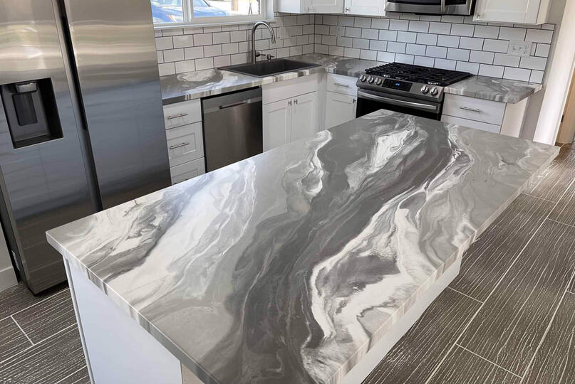 Silver and white epoxy kitchen countertops done in Cement, Oklahoma.